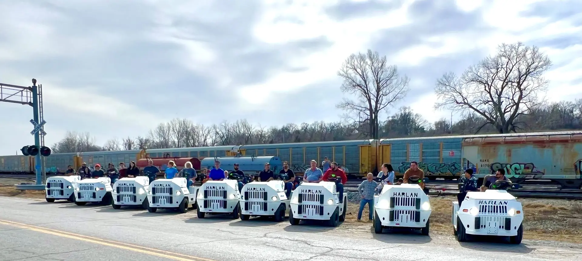 Harlan team proudly posing with newly finished Classic models